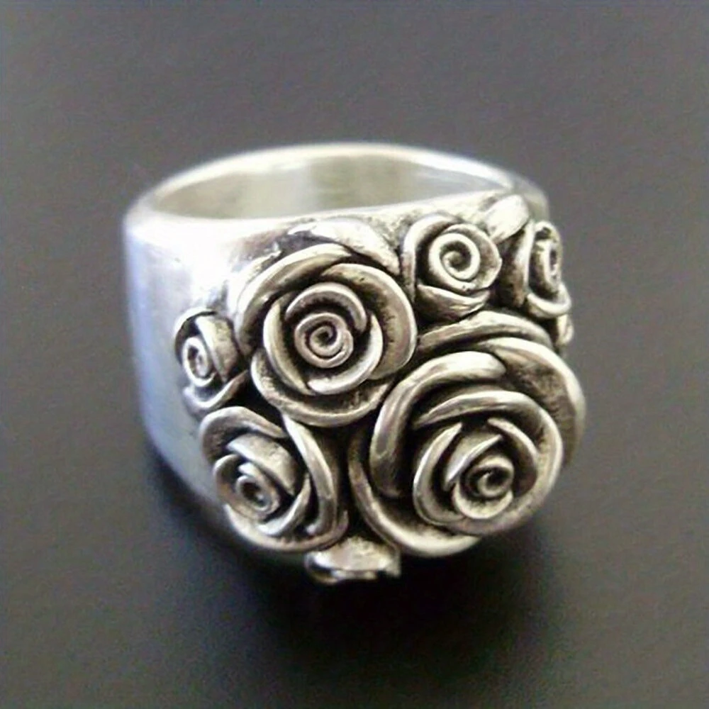 Bague florale vintage en métal argenté