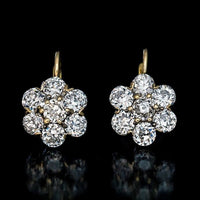 Boucles d'oreilles en or avec fleurs et diamants