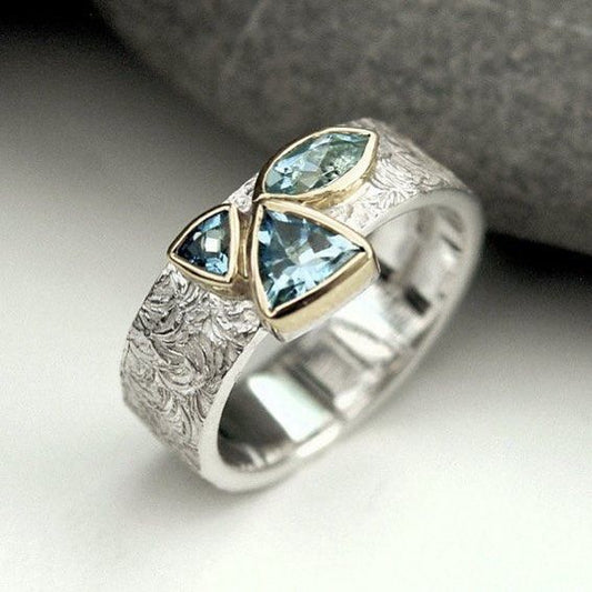 Bague vintage en argent avec incrustation d'aigue-marine