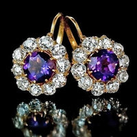 Boucles d'oreilles vintage en verre zirconia violet arrondi