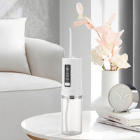 AquaBright™ – Hydropulseur Dentaire Portable pour un Nettoyage Complet