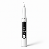 AquaDent™ – Détartreur Dentaire Électrique Rechargeable à 4 Embouts