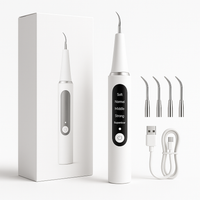 AquaDent™ – Détartreur Dentaire Électrique Rechargeable à 4 Embouts