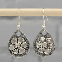 Boucles d'oreilles argentées florales boho