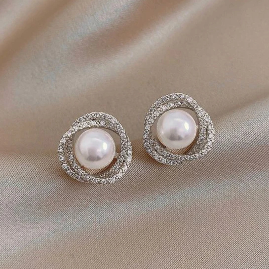 Boucles d'oreilles spirales argentées avec perles