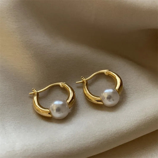 Boucles d'oreilles élégantes avec perles en or