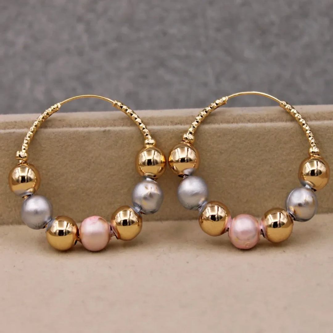 Boucles d'oreilles en or avec perles vintage