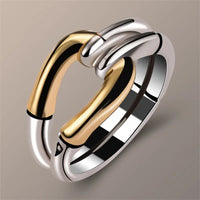 Bague vintage en or et argent noué