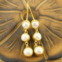 Boucles d'oreilles vintage avec incrustation de perles