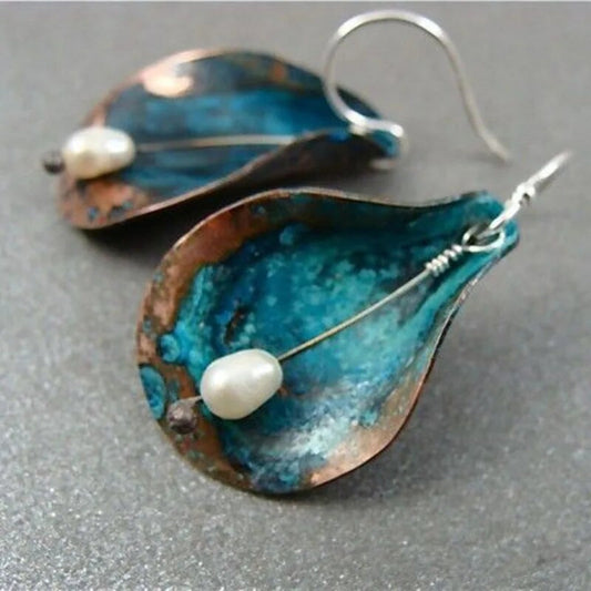 Boucles d'oreilles vintage en forme de feuille avec émail bleu