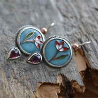 Boucles d'oreilles vintage en émail bleu et cristal rouge
