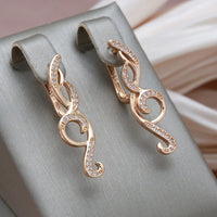 Boucles d'oreilles pendantes en forme de vagues brillantes