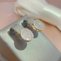 Boucles d'oreilles rondes élégantes et brillantes