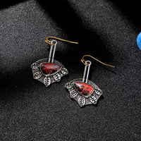 Boucles d'oreilles Irrégulières en Argent avec Pierres Rouges