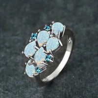 Bague en argent vintage avec opale bleue