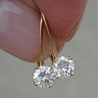 Boucles d'oreilles pendantes vintage en zirconium doré
