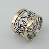 Bague creuse en or et argent avec motif de lierre