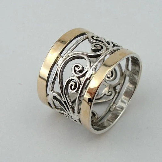 Bague creuse en or et argent avec motif de lierre