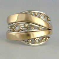 Bague vintage ondulée en or et zirconium