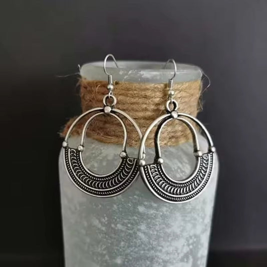 Boucles d'oreilles créoles vintage en argent creuses