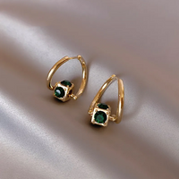 Boucles d'oreilles vertes élégantes en or