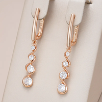 Boucles d'oreilles pendantes avec cristaux blancs
