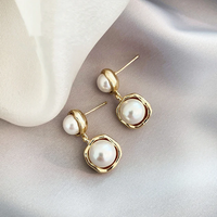 Boucles d'oreilles élégantes à double perle