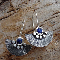 Boucles d'oreilles vintage en argent avec pierres bleues