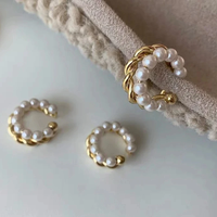 Boucles d'oreilles élégantes en perles enchevêtrées