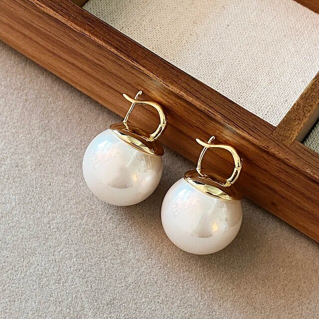 Boucles d'oreilles élégantes en grosses perles