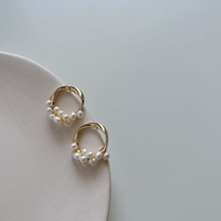 Boucles d'oreilles élégantes en perles incrustées