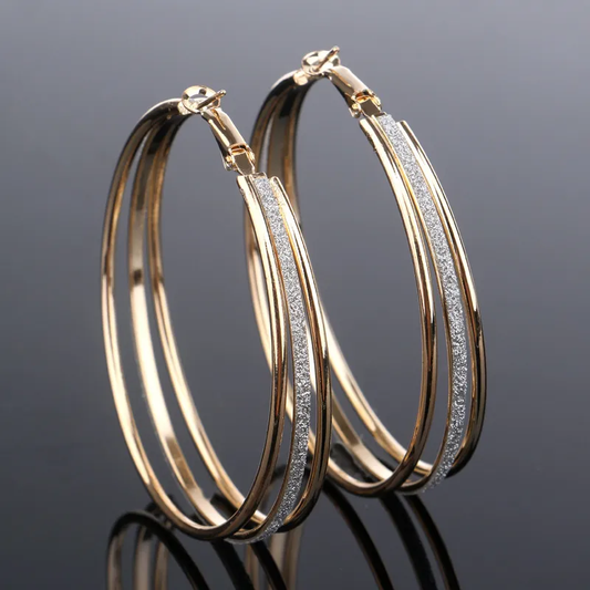 Boucles d'oreilles vintage plaquées or et brillantes