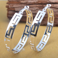 Boucles d'oreilles creuses vintage en or et argent