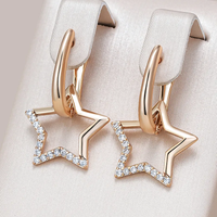 Boucles d'oreilles élégantes en forme d'étoiles dorées et brillantes