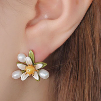 Boucles d'oreilles vintage en perles de marguerite
