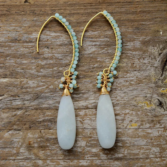 Boucles d'oreilles vintage avec pierres blanches