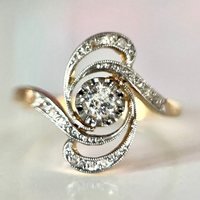 Bague vintage en or avec spirale de zirconium