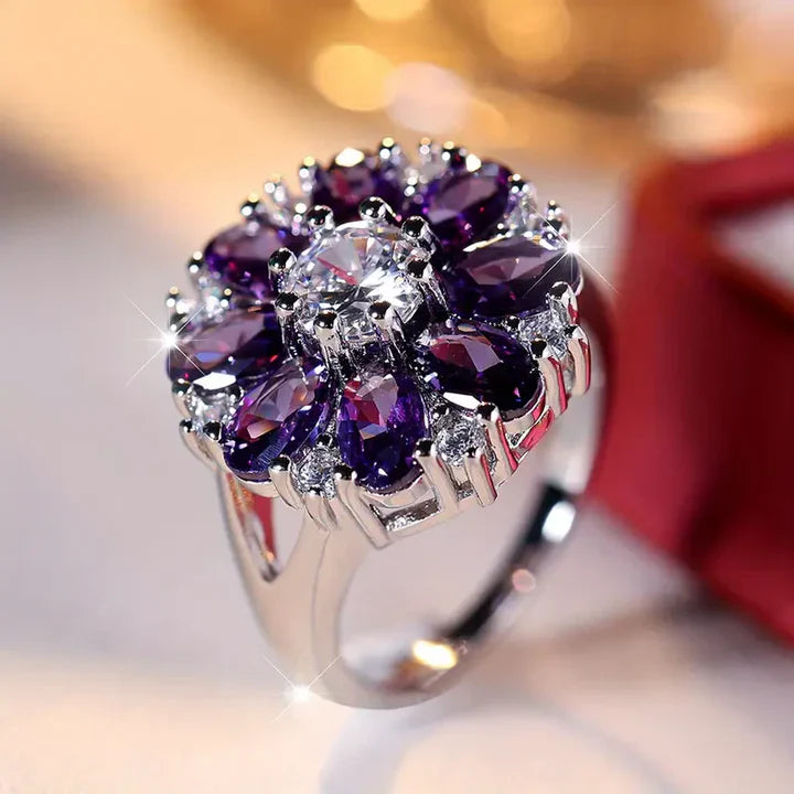 Bague vintage en argent avec marguerite violette