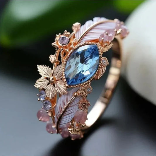 Bague plume exotique en cristal bleu