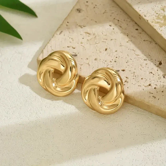 Boucles d'oreilles vintage en spirale dorée