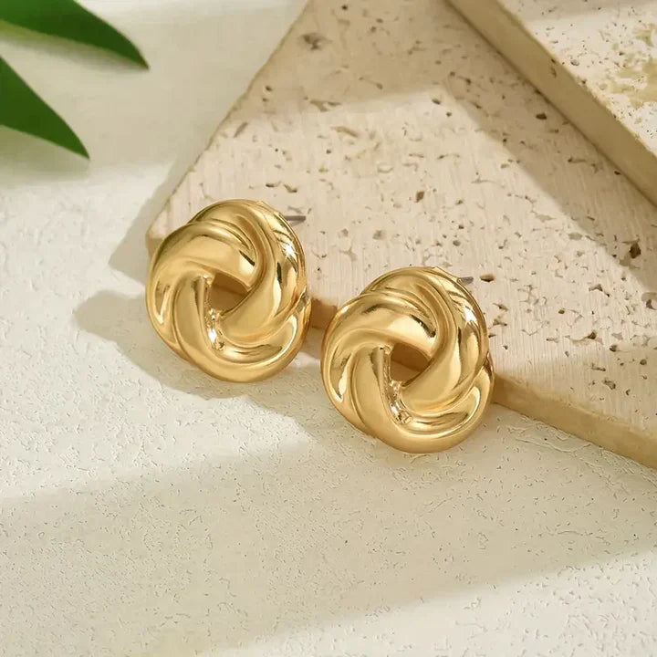 Boucles d'oreilles vintage en spirale dorée
