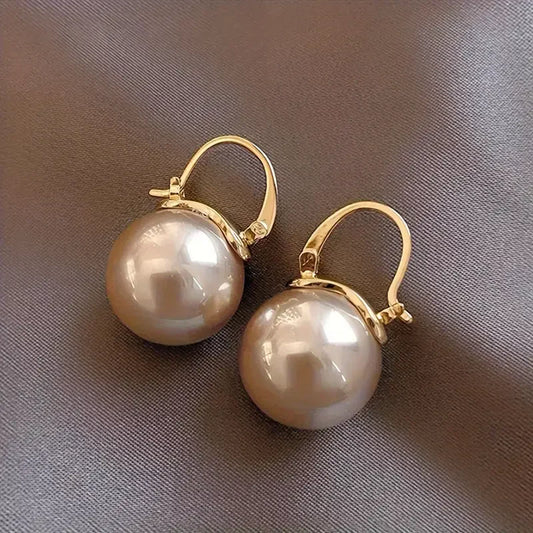 Boucles d'oreilles exquises en perles d'or