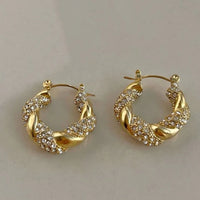 Boucles d'oreilles créoles tressées dorées