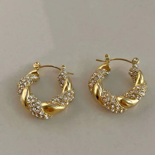 Boucles d'oreilles créoles tressées dorées